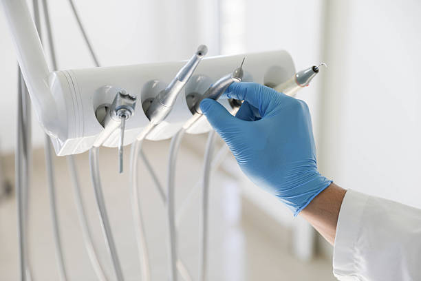 Professional Tooth Extraction technician working in Brookville, NY
